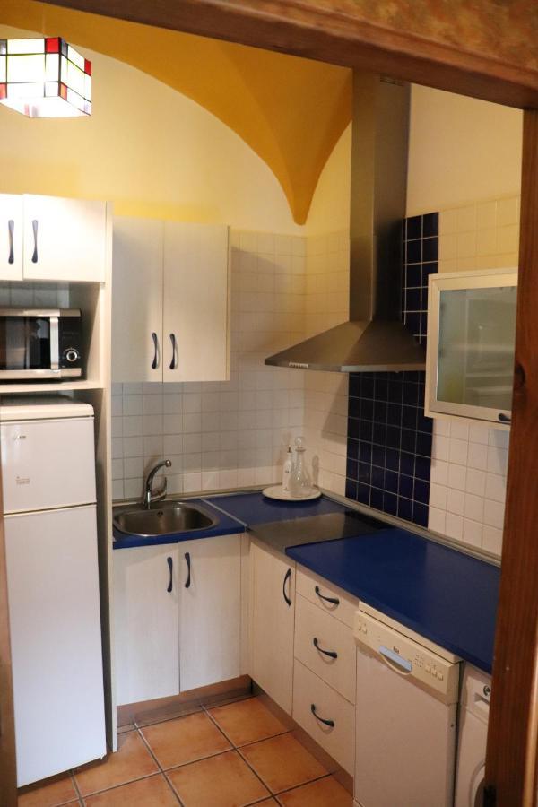 Apartamentos Las Buganvillas Caces Kültér fotó